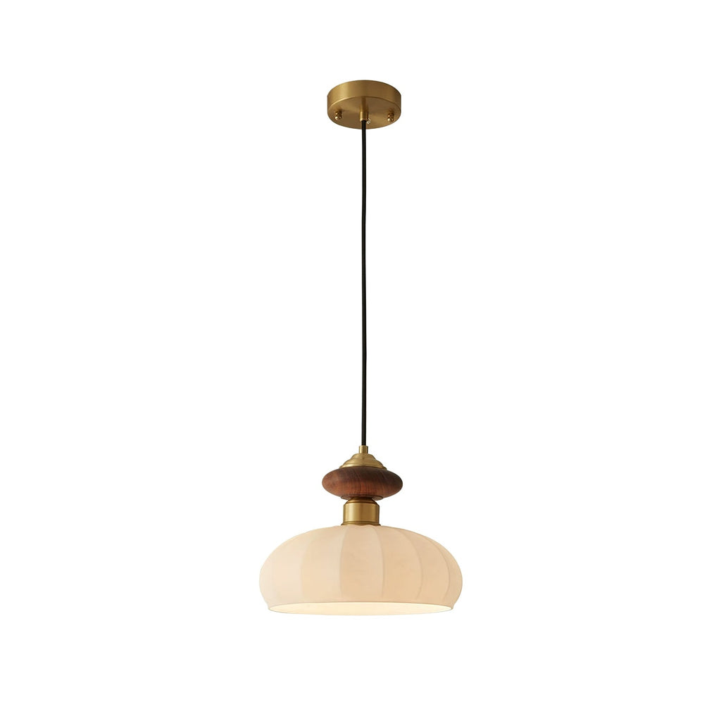 A Clérachic pendant on a black cord with a round brass ceiling plate, shown unlit against a white backdrop.