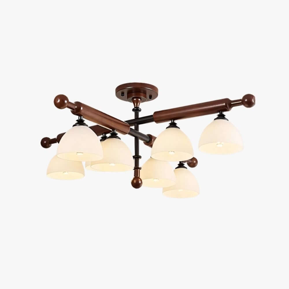 Walnut-finished wood bars with ball ends cross above frosted glass shades on this Clérachic semi flush ceiling light, on white.