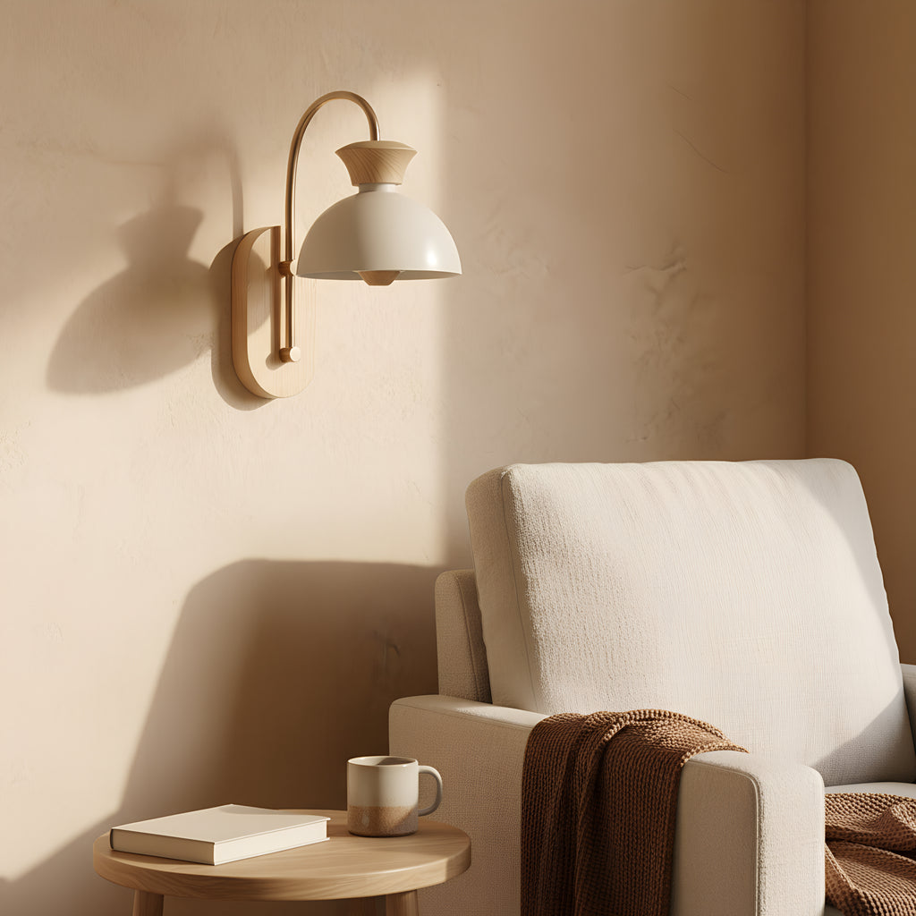 The oak version in a reading corner by day, morning sun raking across the plaster and the timber backplate