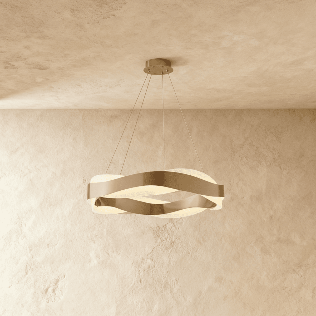 Clérachic round wavy chandelier in brushed gold, hung on four fine cables below a textured plaster ceiling.