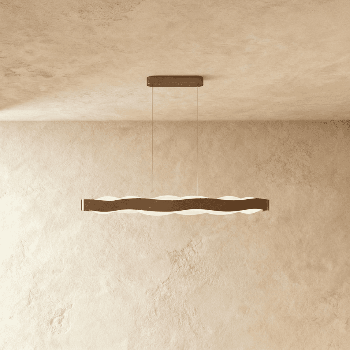 Clérachic linear wavy LED pendant in a bronze-toned finish, hung on two fine cables with an oblong ceiling plate.