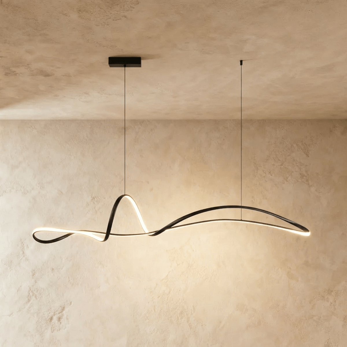 Clérachic black looping ribbon pendant lit along its edge, on two fine cables from a small rectangular canopy.