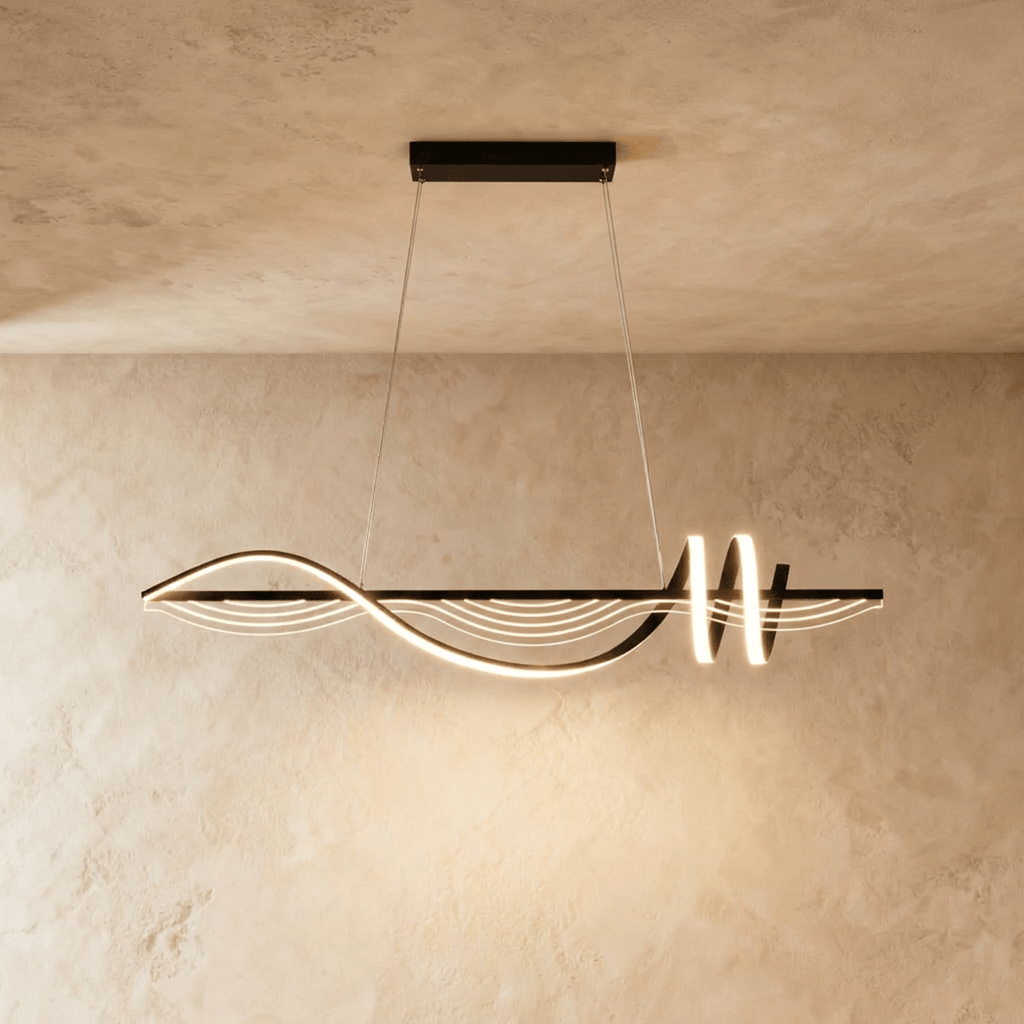 Clérachic black linear pendant shaped as one wavy LED ribbon with a double loop at one end, hung on fine cables from a canopy.