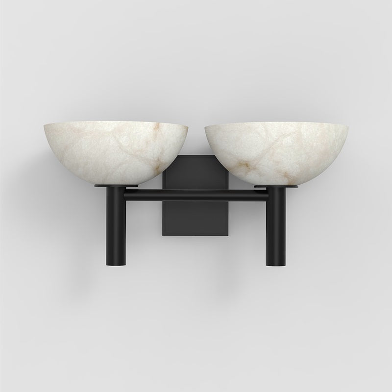 The Clérachic Weft sconce in black, angled to show how little the bracket projects from the wall.