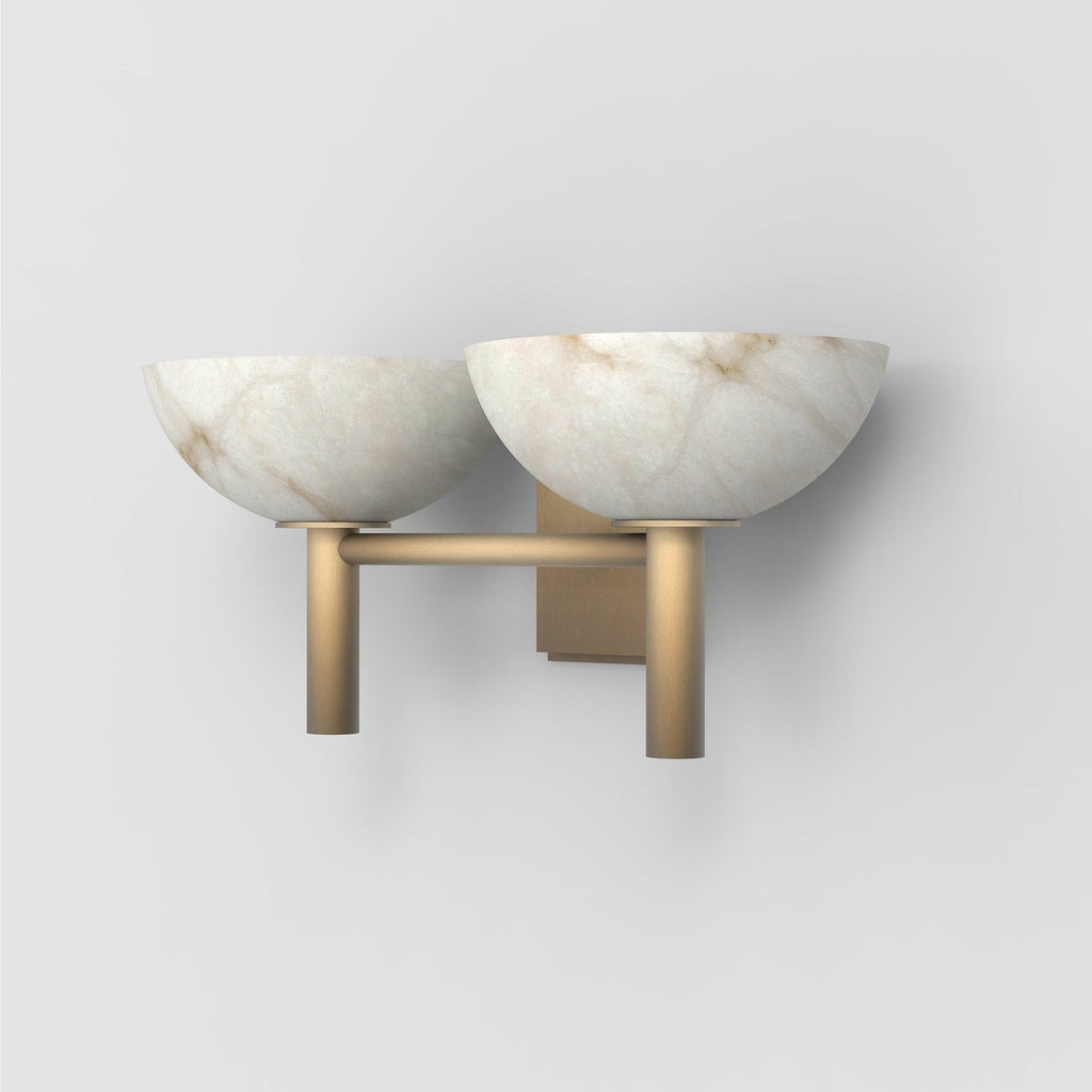 The Clérachic Weft sconce in brass from the left, showing the drop of the two posts below the alabaster bowls.