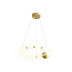 A smaller Clérachic chandelier of white globes arranged in a double ring, on a plain white backdrop.