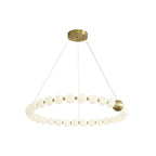 A single ring of white globes on this Clérachic chandelier, with one brass sphere and a round brass canopy, on white.