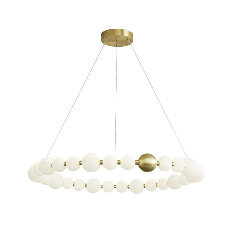 The largest single-ring Clérachic chandelier, with a wide span of white globes and three suspension cables, on white.
