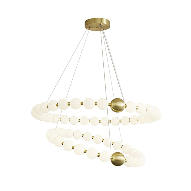 The widest two-ring Clérachic chandelier on white, with brass spheres marking each loop of white globes.