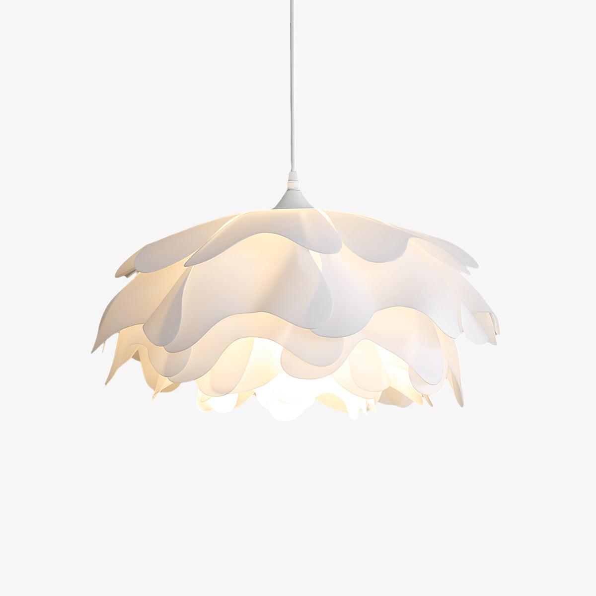 Cut-out view of this Clérachic petal pendant on a pale backdrop, with its tiers of white acrylic lit from within.