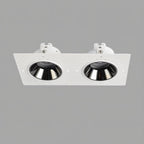 Clérachic double trimless downlight with two chrome cones set in one white plaster-in plate, angled to show both openings.