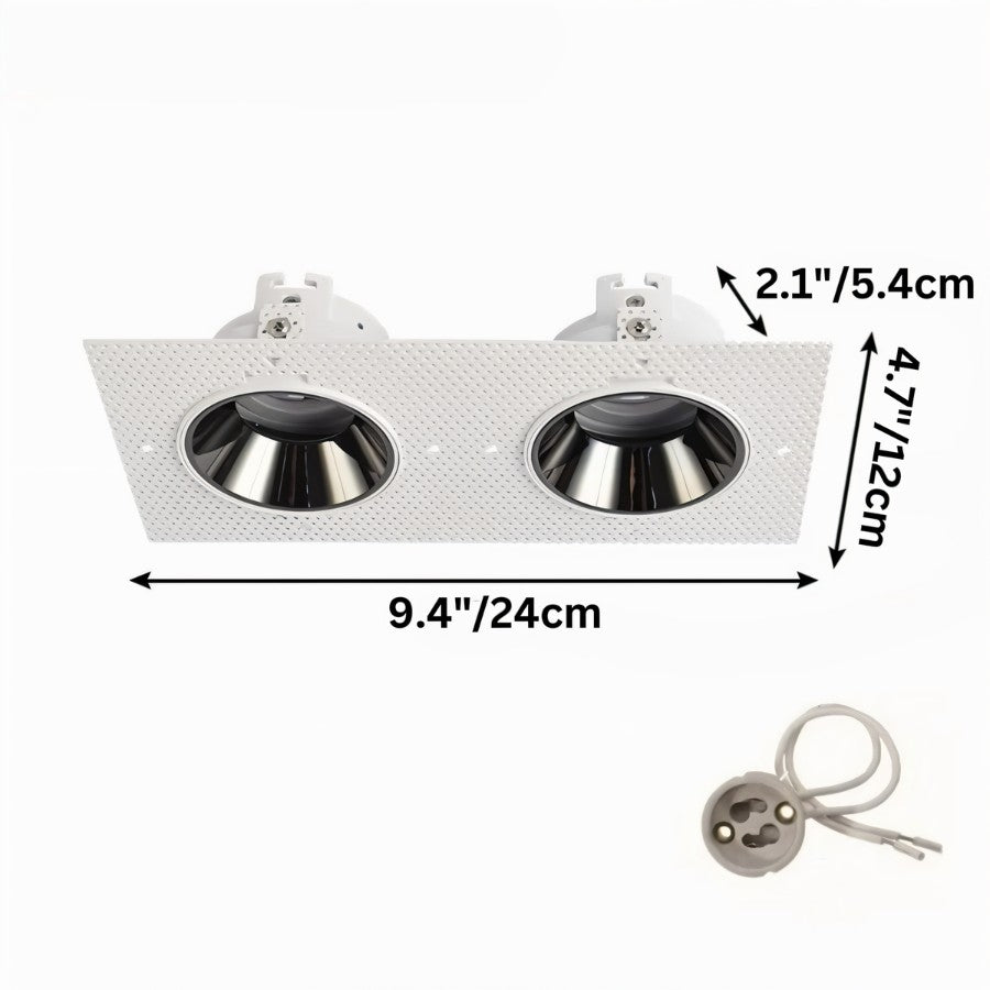 A second angle on the Clérachic double trimless downlight's 24 cm plate with its pair of black anti-glare cones.