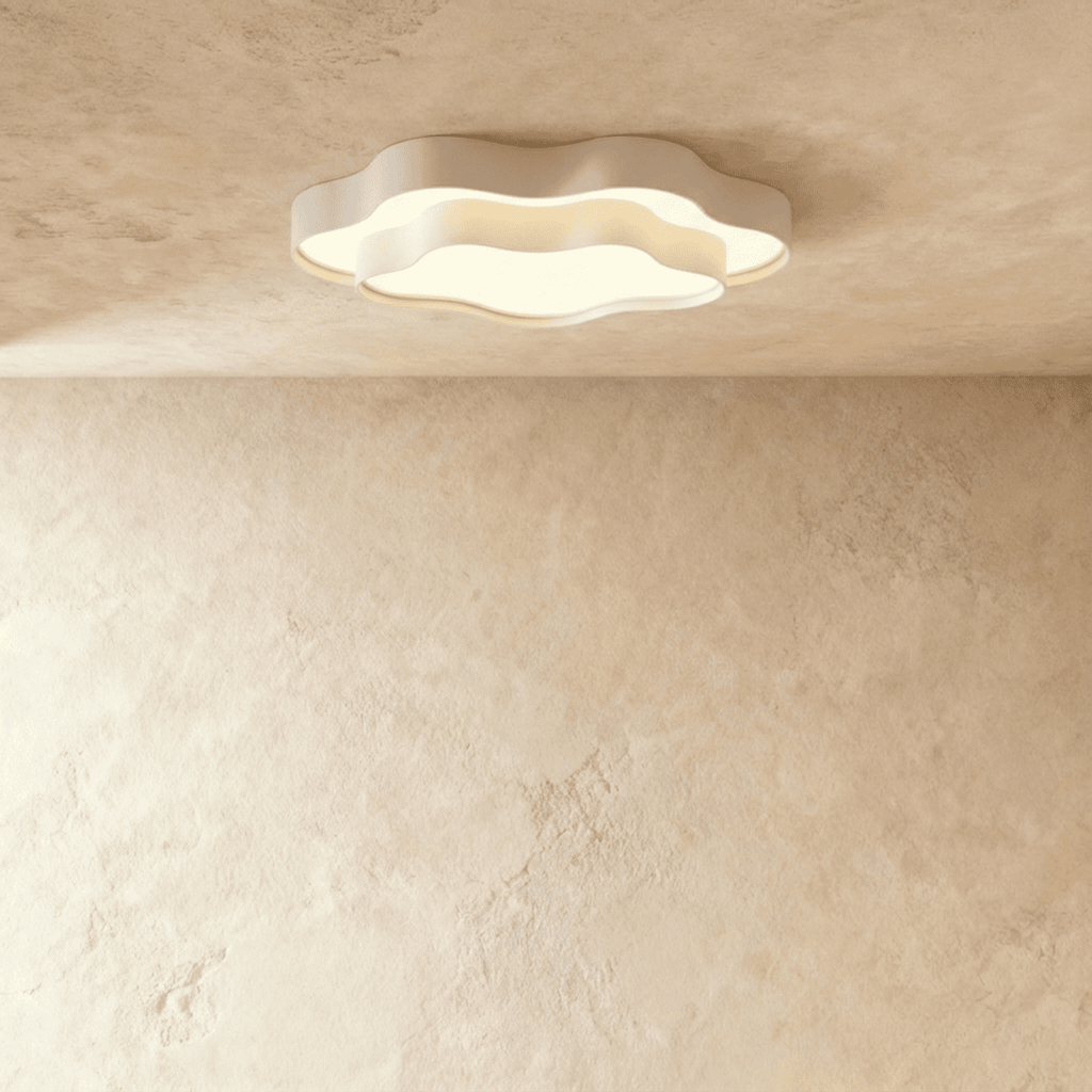 Clérachic white wavy-edged ceiling light with a soft frosted acrylic panel, mounted flat on a plaster-effect ceiling.