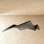 This Clérachic bar chandelier spreads its dark bars into a wide double fan against a sandy plaster backdrop.