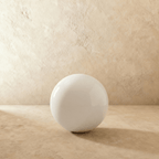 This oversized Clérachic sphere floor lamp appears unlit, showing a matte, more opaque white finish.