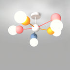 Top-down view of a Clérachic chandelier with a white canopy, thin pink and orange arms and white globes in pink, orange and blue holders.
