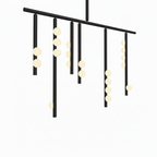 Close view of a black bar and drop rods on this Clérachic chandelier, with white orbs lit warm.