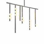 Close view of the nickel-toned bar and drop rods on this Clérachic chandelier, with white orbs lit warm.