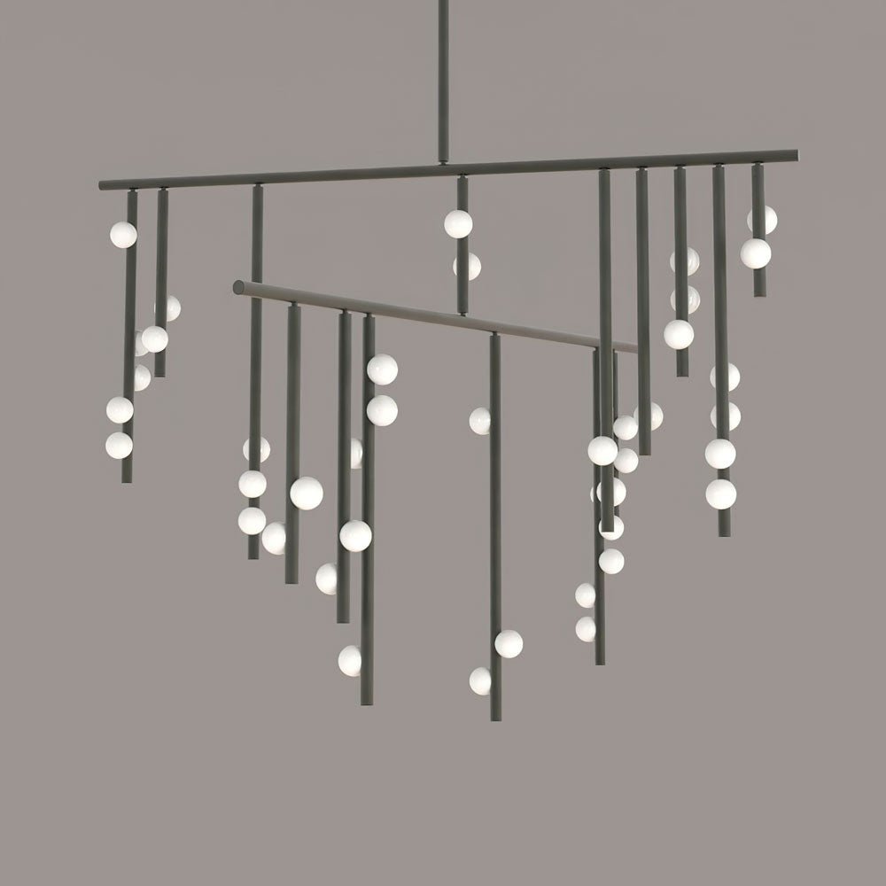 Close view of this Clérachic chandelier in black, with two bars and white orbs spread along the hanging rods.