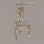 Antique bronze version of this Clérachic chandelier with white orbs, on a taupe backdrop.