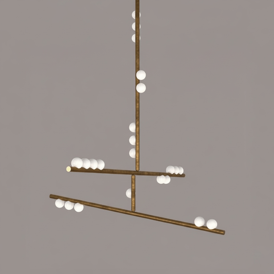 This Clérachic pendant in antique bronze, with two tilted bars and white orbs, on a taupe backdrop.