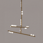 This Clérachic pendant in antique bronze, with two tilted bars and white orbs, on a taupe backdrop.