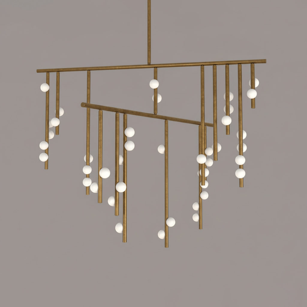Close view of the antique bronze rods on this Clérachic chandelier, with white orbs scattered along them.