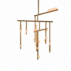 This Clérachic chandelier in an aged brass tone with four bars and white orbs on a white backdrop.