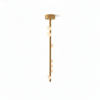 A Clérachic single-rod pendant in a softer brass tone with a round ceiling plate, on a white backdrop.