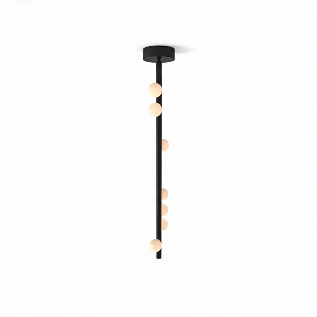 A black Clérachic single-rod pendant with a round ceiling plate and white orbs, on a white backdrop.