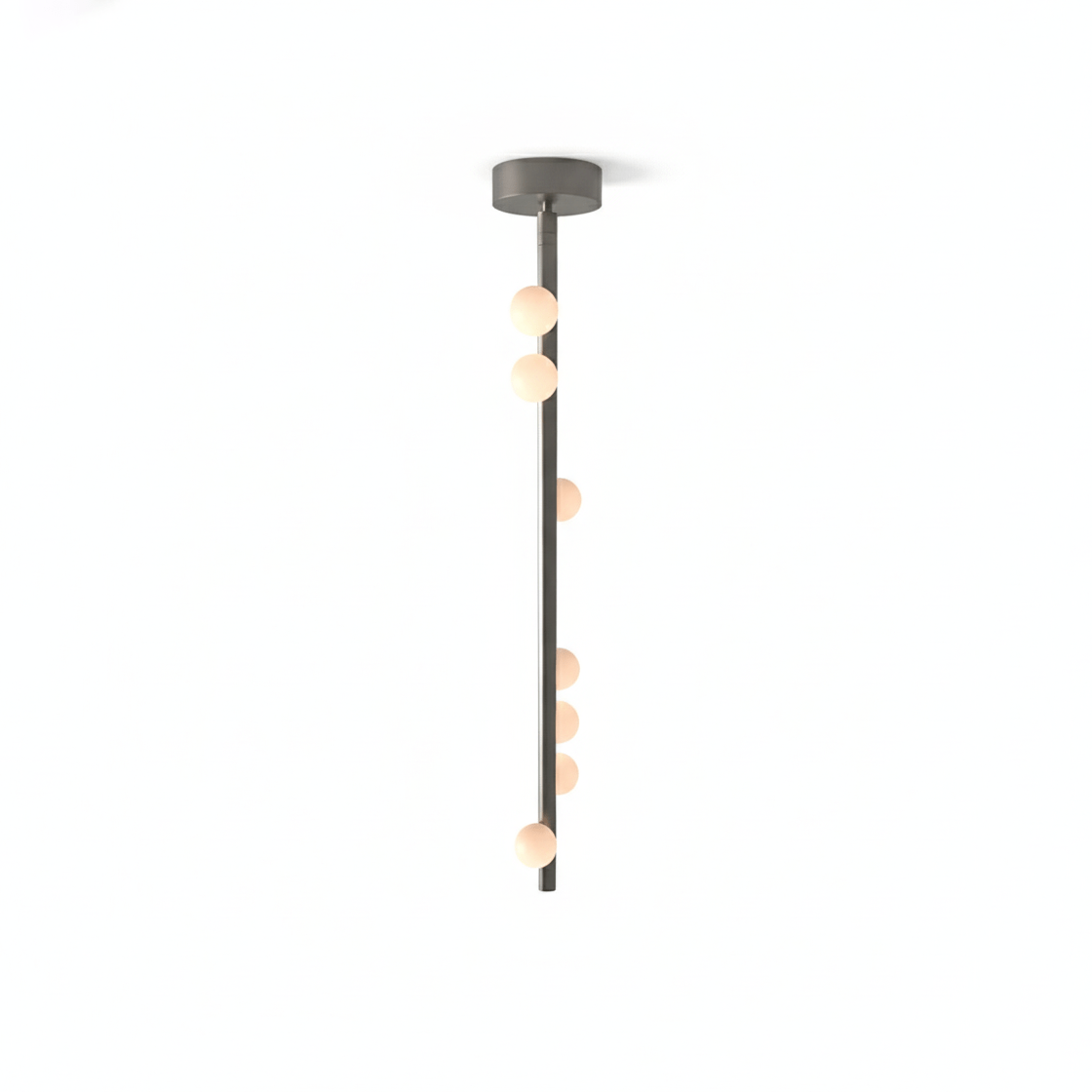 This Clérachic single-rod pendant in a grey metal finish with a round plate, on a white backdrop.