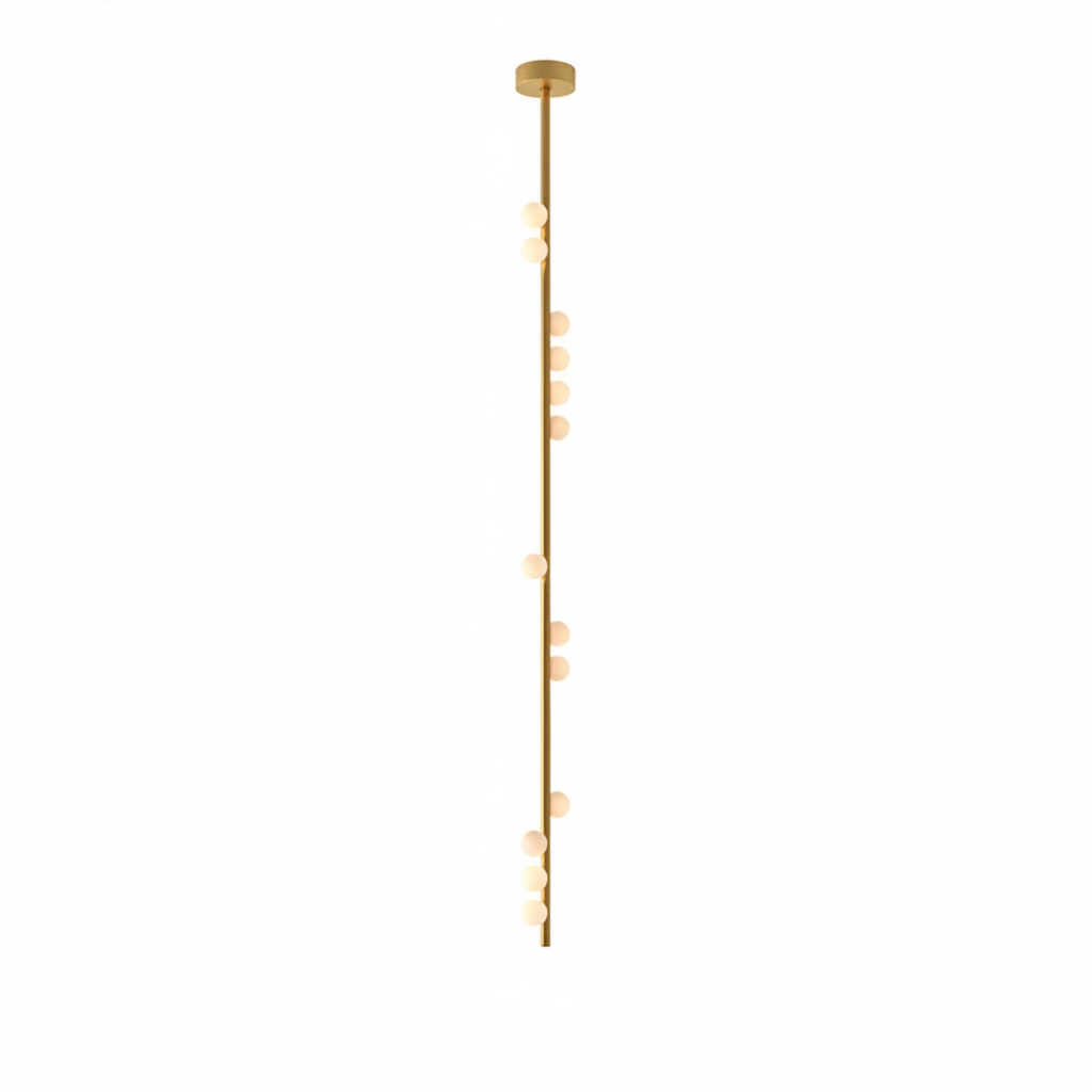 A long brass Clérachic single-rod pendant with a small plate and white orbs along its length.