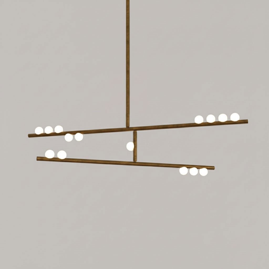 This Clérachic two-bar pendant in antique bronze with white orbs, on a warm taupe backdrop.