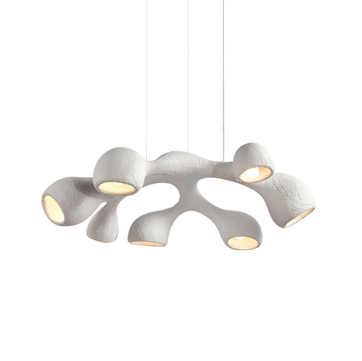 Clérachic pendant on white, branching white arms each ending in a bulb-lit opening, hung from three thin cables.