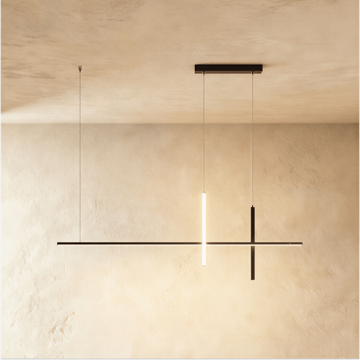 Clérachic pendant light in black, one vertical bar glowing warm white where it crosses the long horizontal arm.