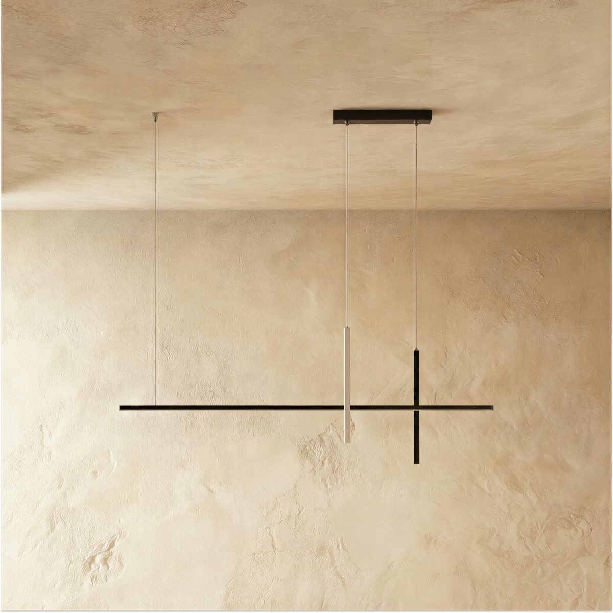 Clérachic pendant light in black, the glowing vertical bar set against its unlit horizontal and cross arms.