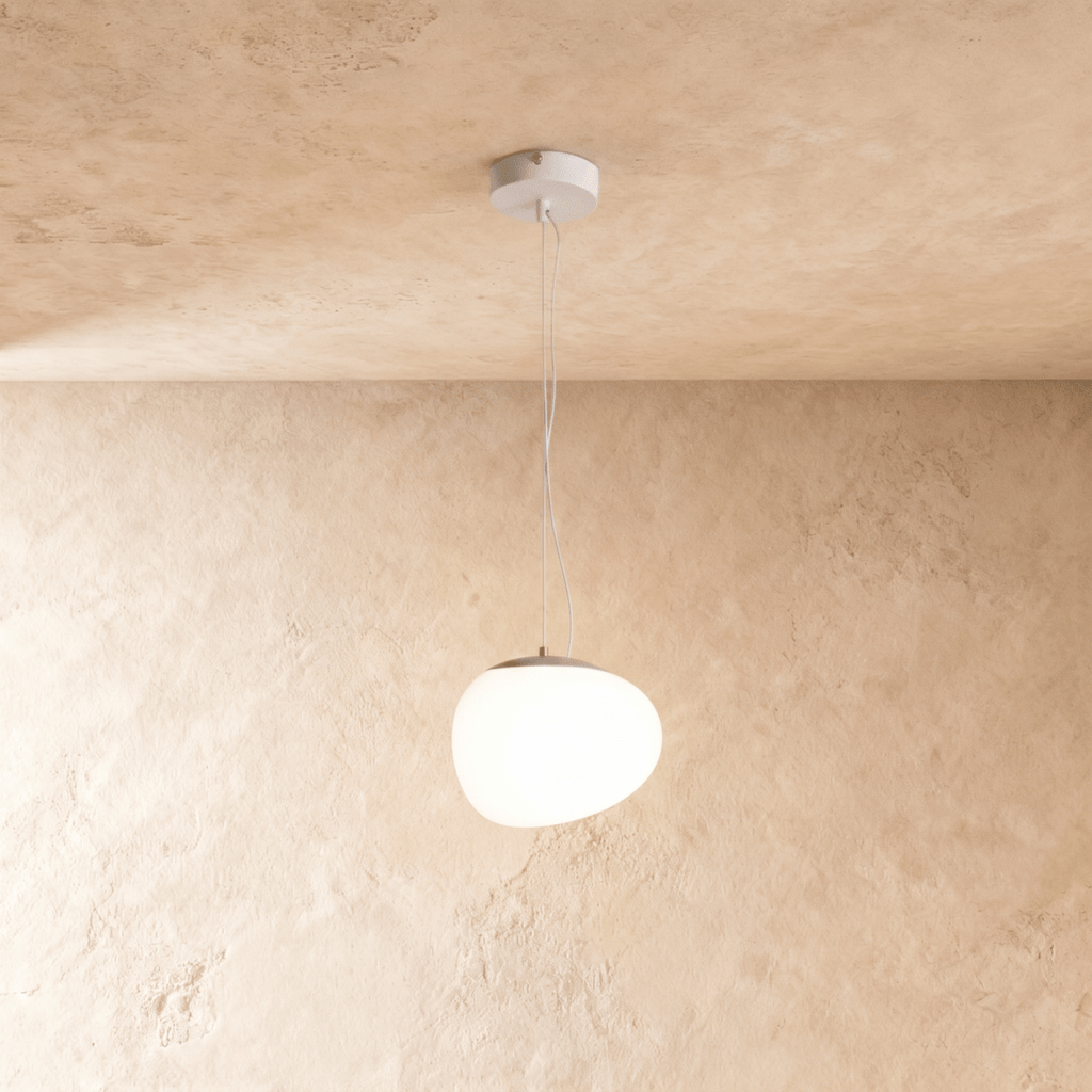 Clérachic pebble-shaped white pendant with a smooth frosted shade on two fine wires from a white round canopy