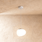 Clérachic large pebble-form pendant in glowing opal white, with a grey cap, hung on two thin wires