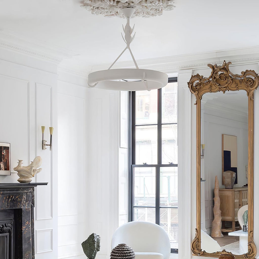 Clérachic ceiling light in a white room with tall windows, a gilt-framed mirror and a marble fireplace at the left.