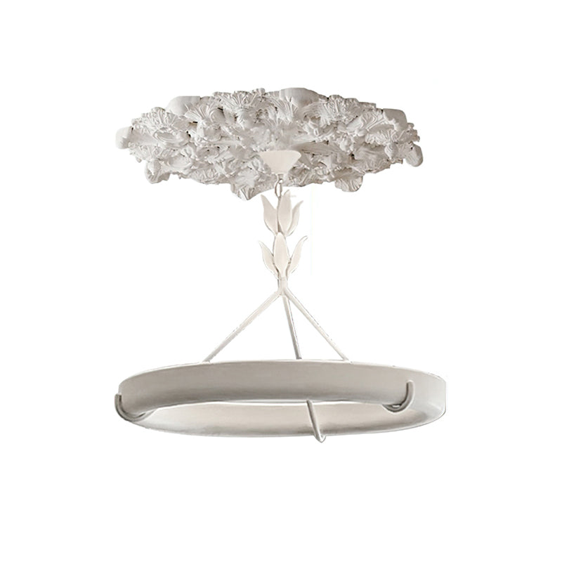 Clérachic ceiling light with its plaster ceiling rose on a white background, the ring hung below on three struts.