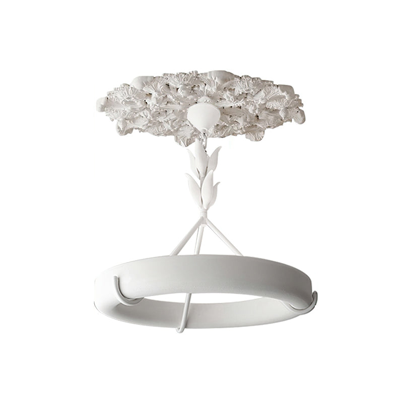 Clérachic ceiling light with its detailed plaster rose, shown on white, with the ring seen from slightly above.