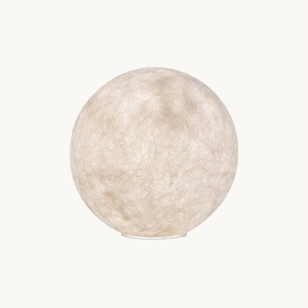 White sphere floor lamp from Clérachic with a textured, fibrous surface, shown on a plain off-white backdrop.