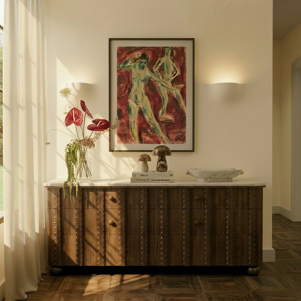 Two Clérachic trimless wall lights flank a framed painting above a studded wooden console table with a marble top.