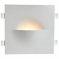 Clérachic trimless wall light shown front-on, lit, with its square plate and side mounting clips.