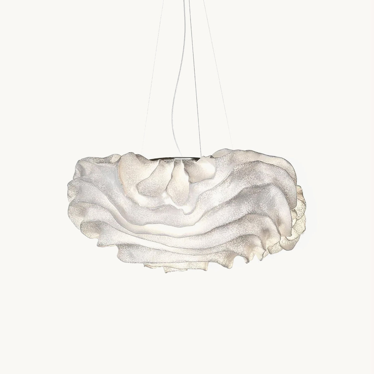 This Clérachic pendant on a plain white backdrop, its white mesh shade folded into soft ruffled layers beneath fine hanging wires.