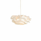 A Clérachic pendant with a soft cream shade and a single cord, lit and shown on a plain white backdrop.