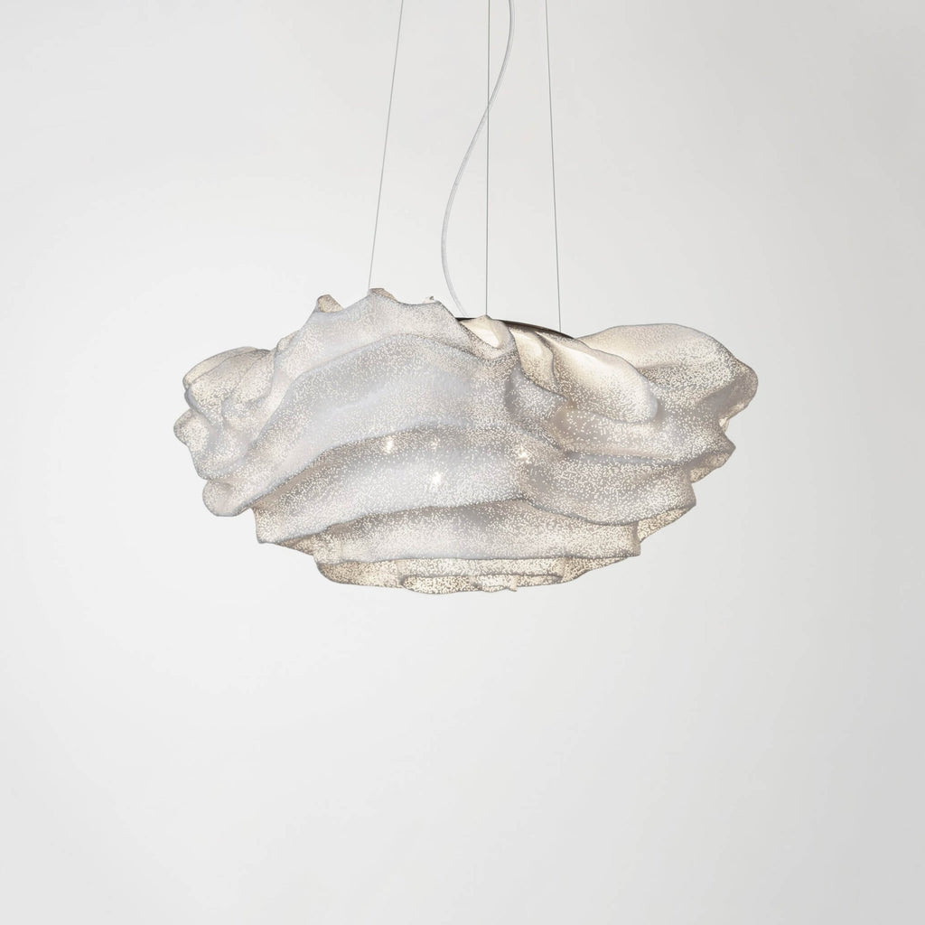 A Clérachic pendant with a compact ruffled mesh shade, unlit on a light grey backdrop.
