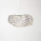 A Clérachic pendant with a layered white shade, a little wider than the last, on a light grey backdrop.
