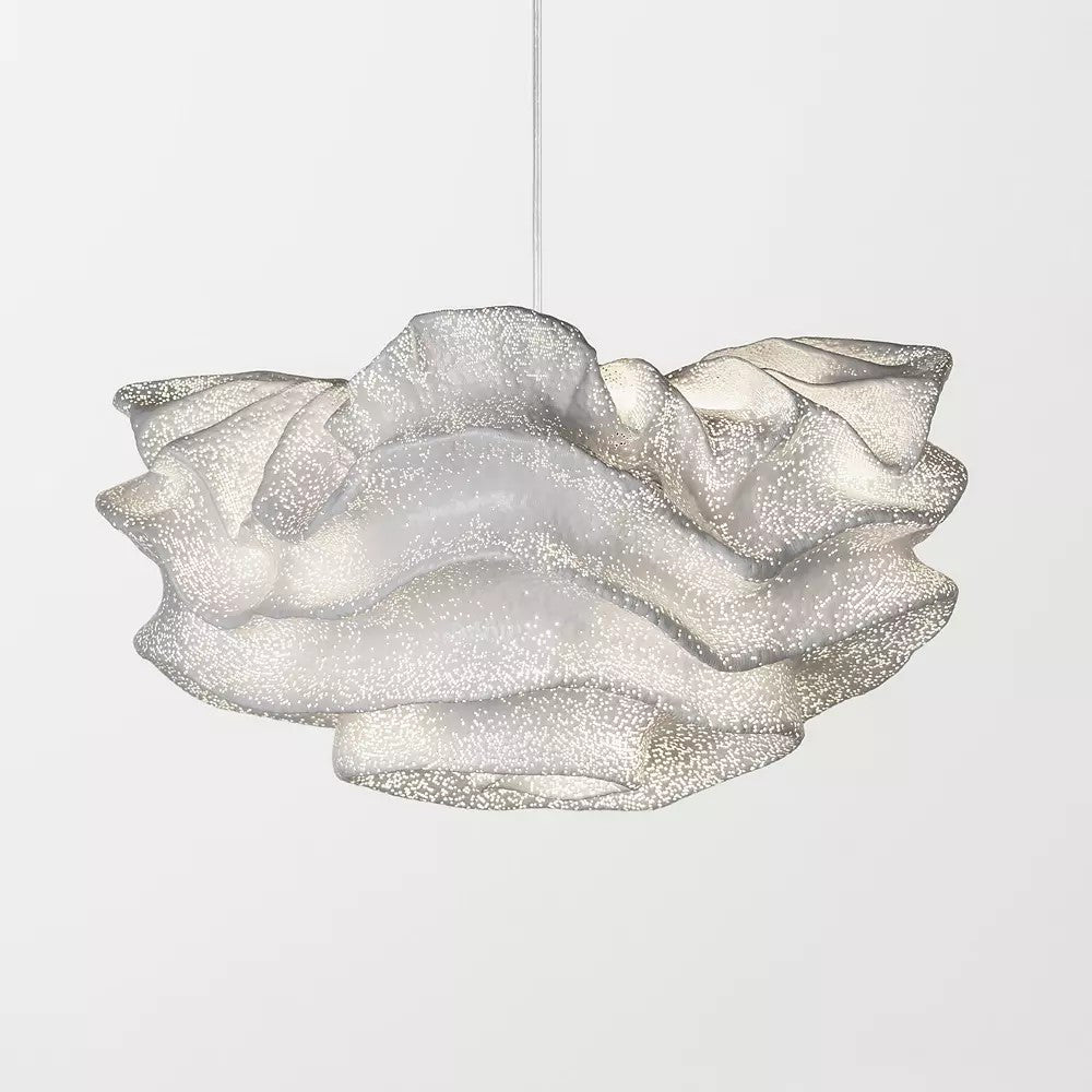 Close side view of the pleated, perforated mesh on this Clérachic pendant, with one hanging cord above.