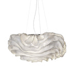 This Clérachic pendant on a white backdrop, with a layered white mesh shade and three fine wires above.